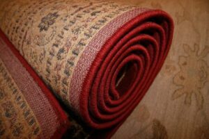 rolled up clean rug