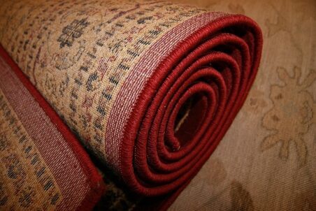 rolled up clean rug
