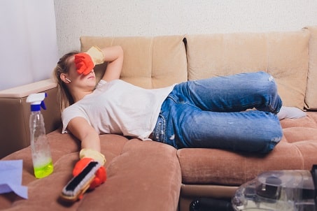 woman-exausted-cleaning-furniture